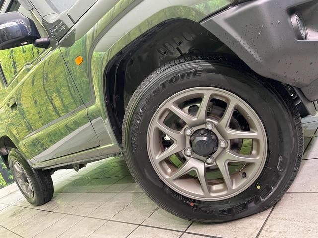 ジムニー ＸＣ　禁煙車　純正８型ナビ　バックカメラ　ＥＴＣ　Ｂｌｕｅｔｏｏｔｈ再生　シートヒーター（前席）　クルコン　コーナーセンサー　セーフティサポート　アイドリングストップ　スマートキー　オートエアコン（51枚目）
