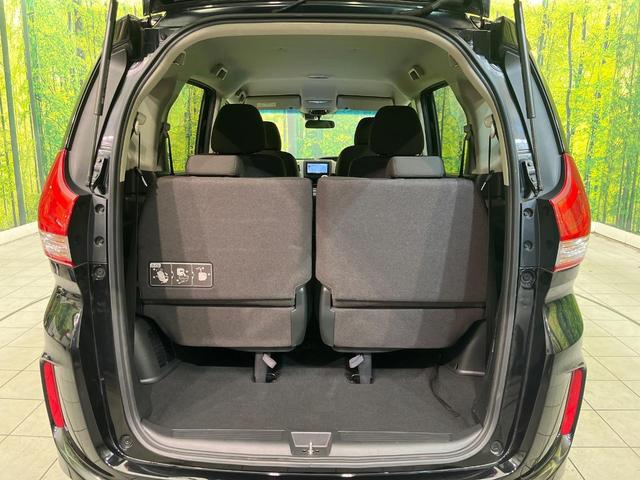 フリード Ｇ・ホンダセンシング　禁煙車　ＳＤナビ　バックカメラ　ＥＴＣ　Ｂｌｕｅｔｏｏｔｈ再生　両側電動スライドドア　クルコン　ホンダセンシング　スマートキー　オートエアコン　横滑り防止装置　アイドリングストップ（11枚目）