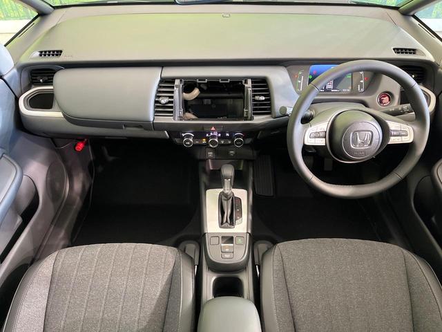 フィット e:HEVホーム 登録済未使用車 ホンダセンシング アダプティブクルーズ オートブレーキホールド オートエアコン スマートキー コーナーセンサー ハーフレザーシート LEDヘッドライト ステアリングスイッチ(2枚目)