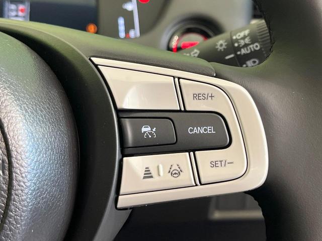 フィット e:HEVホーム 登録済未使用車 ホンダセンシング アダプティブクルーズ オートブレーキホールド オートエアコン スマートキー コーナーセンサー ハーフレザーシート LEDヘッドライト ステアリングスイッチ(4枚目)