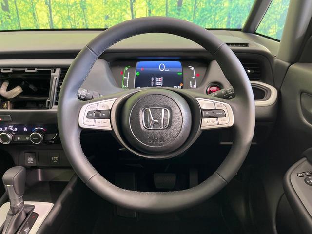 フィット e:HEVホーム 登録済未使用車 ホンダセンシング アダプティブクルーズ オートブレーキホールド オートエアコン スマートキー コーナーセンサー ハーフレザーシート LEDヘッドライト ステアリングスイッチ(11枚目)