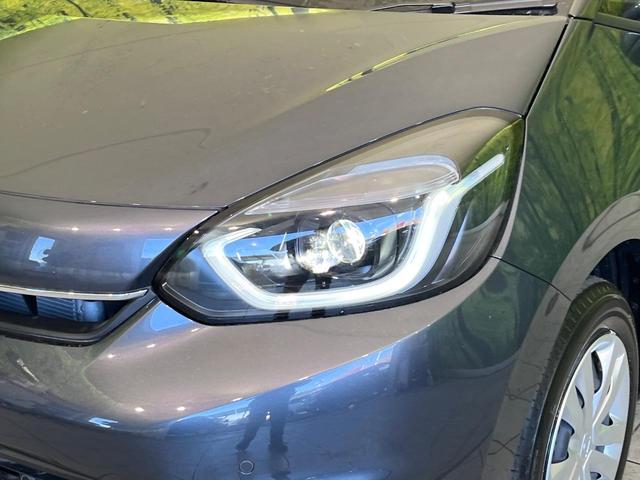 フィット e:HEVホーム 登録済未使用車 ホンダセンシング アダプティブクルーズ オートブレーキホールド オートエアコン スマートキー コーナーセンサー ハーフレザーシート LEDヘッドライト ステアリングスイッチ(12枚目)