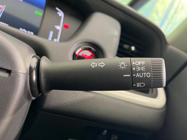 フィット e:HEVホーム 登録済未使用車 ホンダセンシング アダプティブクルーズ オートブレーキホールド オートエアコン スマートキー コーナーセンサー ハーフレザーシート LEDヘッドライト ステアリングスイッチ(45枚目)