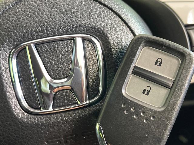 フィット e:HEVホーム 登録済未使用車 ホンダセンシング アダプティブクルーズ オートブレーキホールド オートエアコン スマートキー コーナーセンサー ハーフレザーシート LEDヘッドライト ステアリングスイッチ(48枚目)