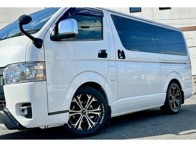 ハイエースバン スーパーＧＬ　ダークプライムＩＩ　２．８ＤＴスーパーＧＬダークプライムＩＩ　９インチワイドナビ・ＴＶ　デジタルインナーミラー　パノラマビュー　両側パワースライドドア　ＴＳＳ　社外１７ＡＷ　オープンカントリータイヤ　黒革調シートカバー（7枚目）