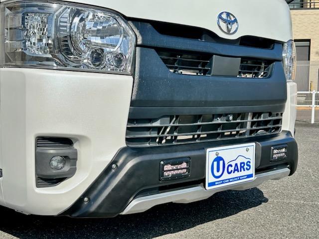 ハイエースバン スーパーＧＬ　ダークプライムＩＩ　２．８ＤＴスーパーＧＬダークプライムＩＩ　９インチワイドナビ・ＴＶ　デジタルインナーミラー　パノラマビュー　両側パワースライドドア　ＴＳＳ　社外１７ＡＷ　オープンカントリータイヤ　黒革調シートカバー（11枚目）