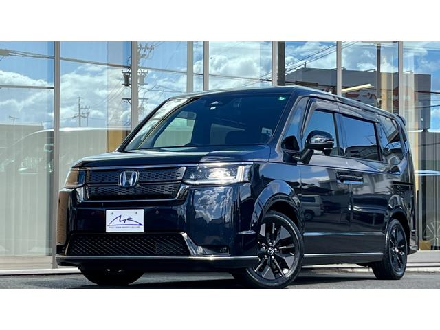 ステップワゴン e:HEVスパーダ ・純正ナビTV・後席フリップダウンモニター・バックカメラ・純正前後ドライブレコーダー・ビルトインETC・両側パワースライド・パワーバックドア・ハーフレザーシート・シートヒーター・BSM・Cソナー・禁煙(2枚目)