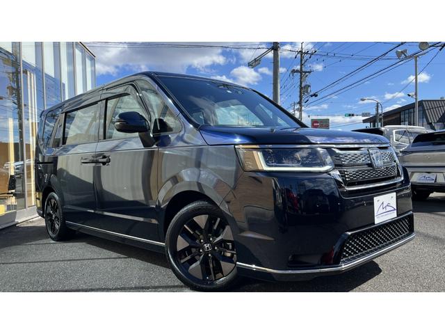 ステップワゴン e:HEVスパーダ ・純正ナビTV・後席フリップダウンモニター・バックカメラ・純正前後ドライブレコーダー・ビルトインETC・両側パワースライド・パワーバックドア・ハーフレザーシート・シートヒーター・BSM・Cソナー・禁煙(4枚目)