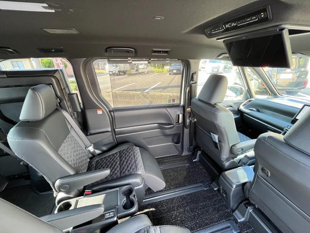 ヴォクシー ハイブリッドＳ－Ｚ　・１０．５型ナビＴＶ・１３．２型有機ＥＬ後席モニター・ＣＤ／ＤＶＤデッキ・快適利便パッケージ・アドバンスドドライブ・パワーバックドア・前後シートヒーター・ＡＣ１００Ｖ１５００Ｗ・ＨＤＭＩ・ＥＴＣ２．０（63枚目）