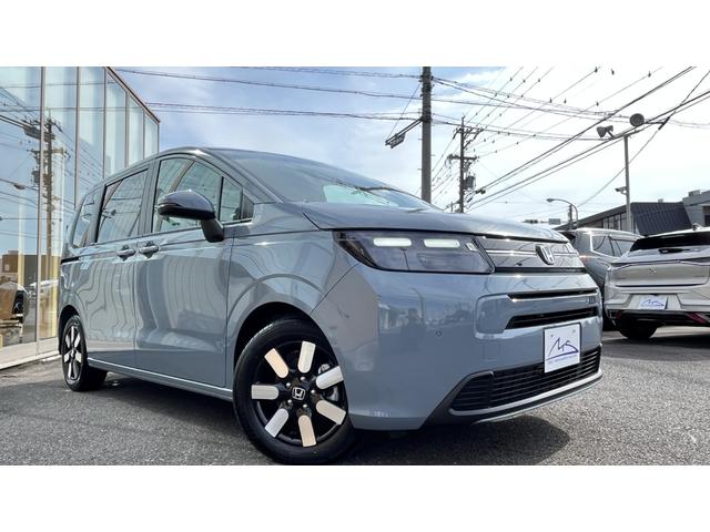 フリード e:HEVエアー EX ・カロッツリア10.1インチディスプレイオーディオ・YouTube視聴可・Carplay・AndroidAuto・バックカメラ・前後室内3方向ドラレコ・両側パワースライド・シートヒーター・リヤクーラー(4枚目)