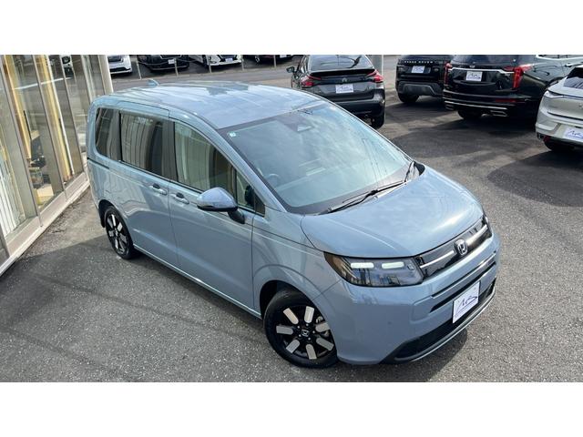 フリード e:HEVエアー EX ・カロッツリア10.1インチディスプレイオーディオ・YouTube視聴可・Carplay・AndroidAuto・バックカメラ・前後室内3方向ドラレコ・両側パワースライド・シートヒーター・リヤクーラー(5枚目)