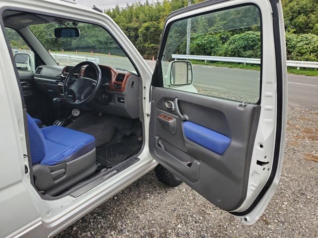 ジムニー FISフリースタイルワールドカップリミテッド インタークーラーターボ リフトアップ 社外マフラー バンパー バンパーガード ターボタイマー ウッド調パネル 4WD オートマ車(8枚目)