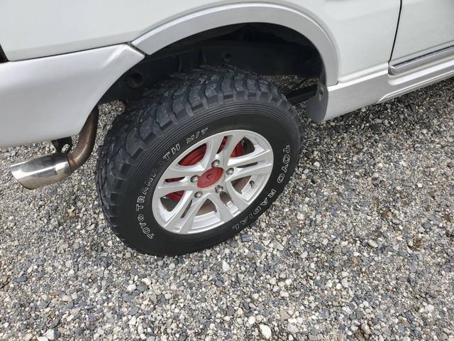 ジムニー FISフリースタイルワールドカップリミテッド インタークーラーターボ リフトアップ 社外マフラー バンパー バンパーガード ターボタイマー ウッド調パネル 4WD オートマ車(9枚目)