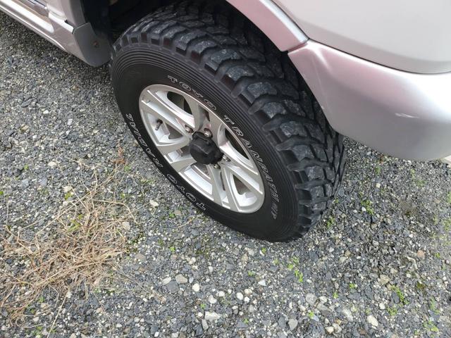 ジムニー FISフリースタイルワールドカップリミテッド インタークーラーターボ リフトアップ 社外マフラー バンパー バンパーガード ターボタイマー ウッド調パネル 4WD オートマ車(10枚目)