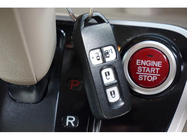 N-BOX G・Lパッケージ ETC バックカメラ 両側電動スライドドア 純正ナビ TV スマートキー アイドリングストップ 電動格納ミラー CVT 盗難防止システム ABS ESC CD DVD再生 USB Bluetooth(7枚目)