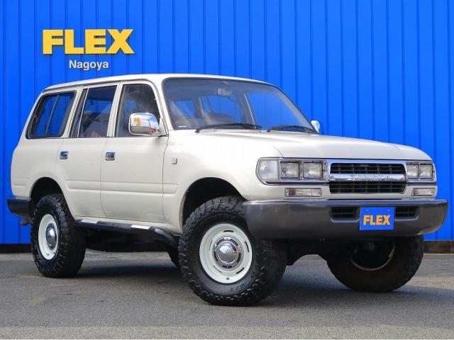 ランドクルーザー８０ ＶＸリミテッド　ソリッドホワイトオール　ペイント　ＤＥＡＮクロスカントリー　ＯＰＥＮＣＯＵＮＴＲＹ　角目四灯ヘッドライト　ＴＯＹＯＴＡグリル　ＦＬＥＸオリジナルシートカバー　ＦＬＥＸオリジナルナルディステアリング（3枚目）