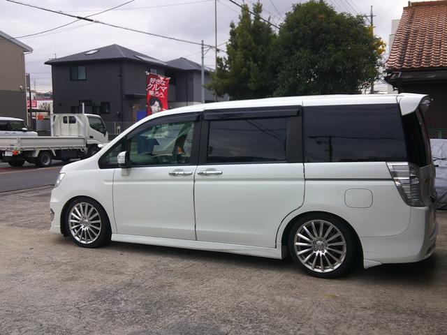 ステップワゴンスパーダ Z 禁煙車 ETC バックカメラ BluetoothハンズフリーフルセグTVナビ 純正カーテン ローダウン 両側電動スライドドア オートライト HID スマートキー アイドリングストップ リアスモーク(5枚目)