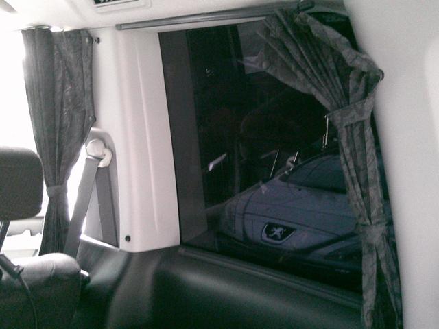 ステップワゴンスパーダ Z 禁煙車 ETC バックカメラ BluetoothハンズフリーフルセグTVナビ 純正カーテン ローダウン 両側電動スライドドア オートライト HID スマートキー アイドリングストップ リアスモーク(17枚目)