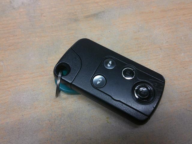 ステップワゴンスパーダ Z 禁煙車 ETC バックカメラ BluetoothハンズフリーフルセグTVナビ 純正カーテン ローダウン 両側電動スライドドア オートライト HID スマートキー アイドリングストップ リアスモーク(26枚目)