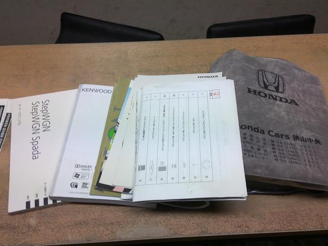 ステップワゴンスパーダ Z 禁煙車 ETC バックカメラ BluetoothハンズフリーフルセグTVナビ 純正カーテン ローダウン 両側電動スライドドア オートライト HID スマートキー アイドリングストップ リアスモーク(27枚目)