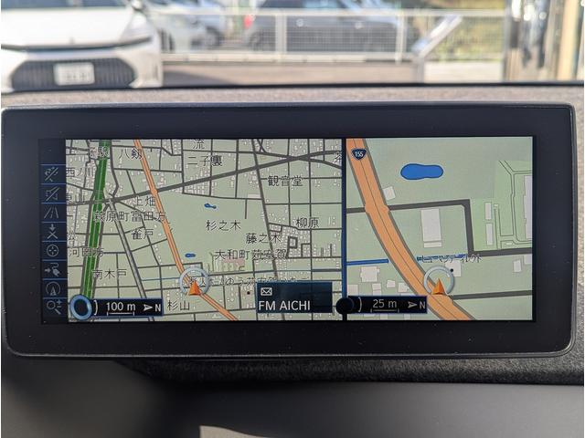 ｉ３ セレブレーションエディション　カーボナイト　４０台限定特別仕様車！　ワンオーナー車　前後ドラレコ　社外フルセグＴＶチューナー付　ハーマンカードンＨｉＦｉスピーカー　１０．２インチＨＤＤナビ　グレー合皮ハーフレザー　ドライビングアシストプラス（18枚目）