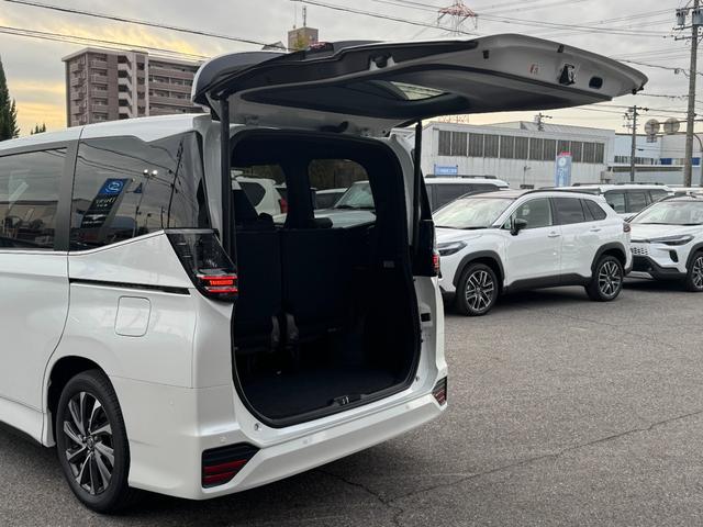 ヴォクシー ハイブリッドＳ－Ｚ　【改モデル！！快適利便パッケージＨｉ！！】１０．５インチディスプレイオーディオ　ＣＤ／ＤＶＤデッキ　三眼ＬＥＤヘッドライト　ユニバーサルステップ　ブラインドスポットモニター　オットマン　シートヒーター（25枚目）