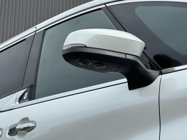 アルファードハイブリッド Ｚ　【左右独立ムーンルーフ！カラーヘッドアップディスプレイ！】アドバンスドパーク１４インチディスプレイオーディオ　１３．２インチフリップダウンモニター　寒冷地仕様　スペアタイヤ　ブラインドスポットモニター（21枚目）