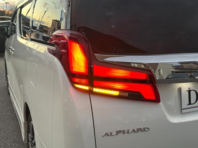 アルファード 2.5S Cパッケージ 【ツインムーンルーフ!フリップダウンモニター】純正ディスプレイオーディオ デジタルインナーミラー スペアタイヤ パワーバッグドア ナビキット ETC オットマン TV ベンチレーション シートヒーター(27枚目)