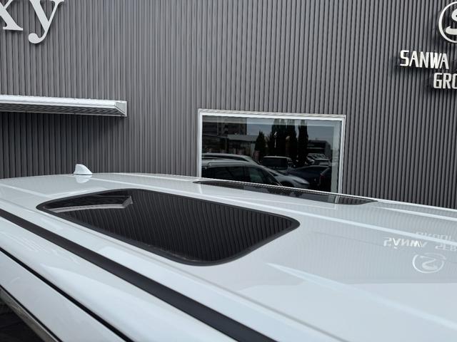 アルファードハイブリッド Z 【左右独立ムーンルーフ!13.2インチフリップダウンモニタ!】アドバンスドパーク 14インチディスプレイオーディオ 寒冷地仕様 スペアタイヤ ブラインドスポットモニター カラーヘッドアップディスプレイ(25枚目)