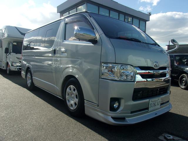 ハイエースバン ロングDX GLパッケージ 5速MT ワンオーナー禁煙車 板金塗装歴無し 車検毎全整備記録簿あり セーフティーセンス 純正ナビTVバックカメラ ソーラーIMPACT製合せガラス モデリスタスポイラー キーレス LEDヘットライト(3枚目)