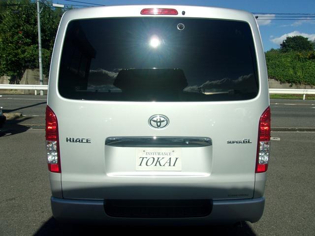ハイエースバン ロングDX GLパッケージ 5速MT ワンオーナー禁煙車 板金塗装歴無し 車検毎全整備記録簿あり セーフティーセンス 純正ナビTVバックカメラ ソーラーIMPACT製合せガラス モデリスタスポイラー キーレス LEDヘットライト(6枚目)