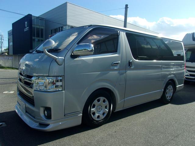 ハイエースバン ロングDX GLパッケージ 5速MT ワンオーナー禁煙車 板金塗装歴無し 車検毎全整備記録簿あり セーフティーセンス 純正ナビTVバックカメラ ソーラーIMPACT製合せガラス モデリスタスポイラー キーレス LEDヘットライト(8枚目)