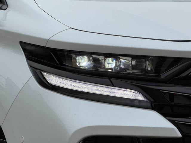 ヴェルファイアハイブリッド Ｚ　プレミア　茶内装　左右独立ムーンルーフ　デジタルインナーミラー　純正１４型ＤＡ　後席モニター　パノラミックビューモニター　ブラインドスポットモニター　スペアタイヤ　置くだけ充電　パワーバックドア　　ＥＴＣ２．０（10枚目）
