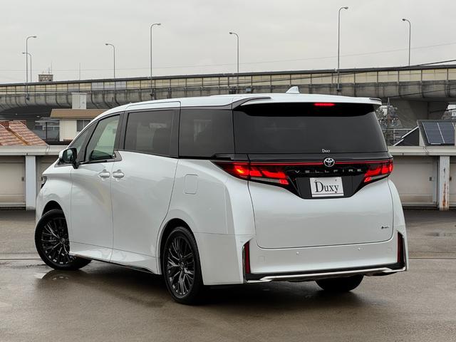 ヴェルファイアハイブリッド Z プレミア 茶内装 左右独立ムーンルーフ デジタルインナーミラー 純正14型DA 後席モニター パノラミックビューモニター ブラインドスポットモニター スペアタイヤ 置くだけ充電 パワーバックドア ETC2.0(27枚目)