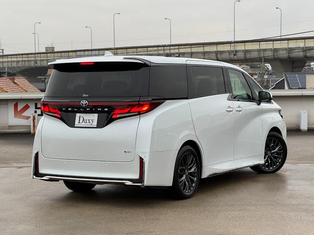 ヴェルファイアハイブリッド Z プレミア 茶内装 左右独立ムーンルーフ デジタルインナーミラー 純正14型DA 後席モニター パノラミックビューモニター ブラインドスポットモニター スペアタイヤ 置くだけ充電 パワーバックドア ETC2.0(28枚目)