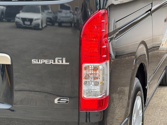 ハイエースバン ロングスーパーGL ダークプライムS パノラミックビューモニター デジタルインナーミラー トヨタセーフティーセンス 専用メッキエンブレム 両側デュアルパワースライドドア スカッフプレート 4本出しスポークステアリングホイール スマートキー(26枚目)