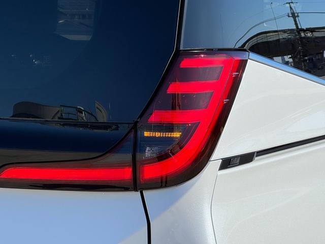 ノア ハイブリッドＳ－Ｚ　改モデル　三眼ＬＥＤ＆ＡＨＳ　１０．５型ナビ　フルセグＴＶ　トヨタチームメイト　快適利便Ｈｉ　デジタルインナーミラー　ヘッドアップディスプレイ　オットマン　ＥＴＣ２．０　全周囲カメラ　ＢＳＭ　ＨＤＭＩ（33枚目）