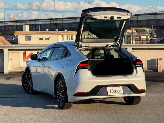 プリウス Ｚ　デジタルインナーミラー　パノラミックビューモニター　ＢＳＭ　１２．３型ナビ　フルセグＴＶ　ＡＣ１００Ｖ　ＥＴＣ２．０　パワーバックドア　ステアリングヒータ　シートヒーター＆クーラー　アドバンスドパーク（27枚目）