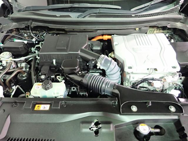 エクリプスクロスＰＨＥＶ ・Ｇ　ｅ－Ａｓｓｉｓｔ　４ＷＤ　１００Ｖ・ＡＣ電源　禁煙　純正８インチＭナビ　フルセグ　ＵＳＢ　ＢＴ　マルチアラウンドＭ　インテリキー　ＬＥＤヘッド　レーダークルーズＣ　ＡＴハイビーム　ブラインドスポットＭ　ヘッドアップＤＰ　ハーフレザー　純正１８ＡＷ（33枚目）
