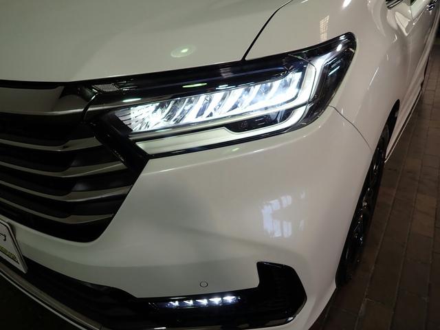 オデッセイハイブリッド e:HEV ABSOLUTE EX HondaSENSING 禁煙 ナビ装着用SP 純10インチナビ フルセグ DVD BT マルチビューカメラ ETC2.0 ドラレコ ハーフレザー Wパワスラ Pテールゲート 純ノイズリデューシング18AW AC電源1500W(26枚目)