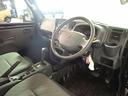 Ｘ　４ＷＤ　Ａ／Ｔ　デュアルカメラブレーキサポート　純正ＣＤデッキ　ＡＵＸ　キーレスエントリー　オートライト　フォグ　Ｐ／Ｓ　Ｐ／Ｗ　Ｄ席リクライニング４０°＆スライド１８０ｍｍ　オーバーヘッドシェル　パーキングアシストソナー　パートタイム４ＷＤ　禁煙（15枚目）