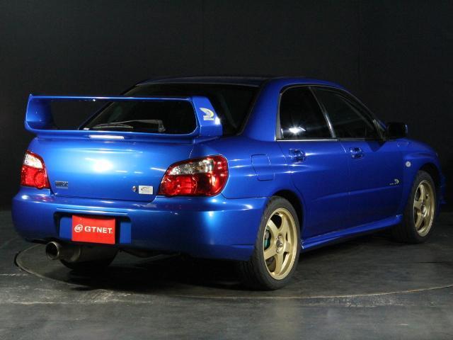 インプレッサ ＷＲＸ　２００３Ｖリミテッド　オリジナルベース車　純正エアロ　大型リアスポ　ＳＴＩマフラー　ＨＫＳエアクリ　キセノン　ＲＡＹＳ１７アルミ　ＥＴＣ（2枚目）