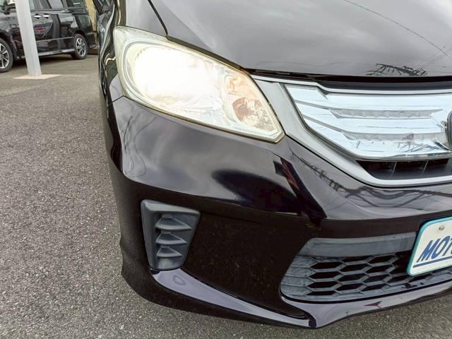 フリードハイブリッド ジャストセレクション　ＨＤＤナビ　両側電動スライドドア　Ｂｌｕｅｔｏｏｔｈオーディオ　クルーズコントロール　ＥＴＣ　フルセグＴＶ　音楽録音　ウォークスルー　３列シート　純正アルミ　ＣＤ／ＤＶＤ再生　ハーフレザーシート（22枚目）