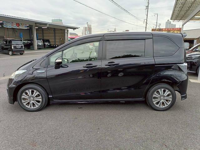 フリードハイブリッド ジャストセレクション　ＨＤＤナビ　両側電動スライドドア　Ｂｌｕｅｔｏｏｔｈオーディオ　クルーズコントロール　ＥＴＣ　フルセグＴＶ　音楽録音　ウォークスルー　３列シート　純正アルミ　ＣＤ／ＤＶＤ再生　ハーフレザーシート（37枚目）