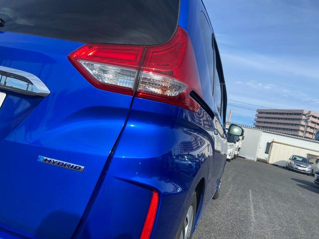 フリードハイブリッド ハイブリッド・Ｇ　サイドリフトアップシート車　社外ナビ　フルセグＴＶ　バックカメラ　ＥＴＣ　スマートキー　プッシュスタート　禁煙　ワンオーナー（23枚目）