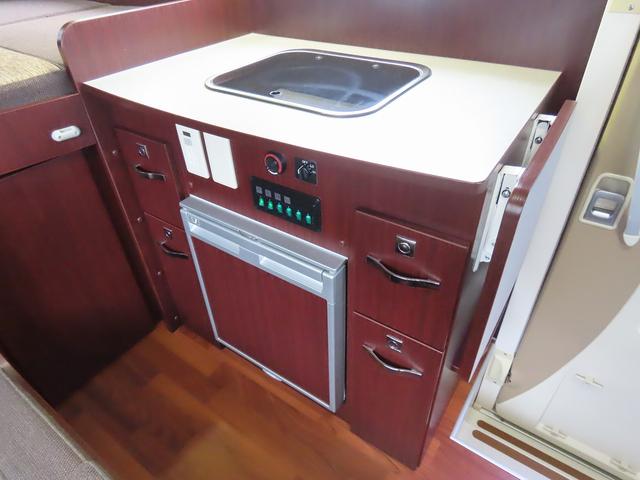カムロード  キャンピングカー ナッツRV製 クレソンボヤージュX FFヒーター マックスファン 60LDC冷蔵庫 給排水ポリタンク シンク 走行充電 外部充電器 キーレス ACコンセント ツインサブバッテリー(23枚目)