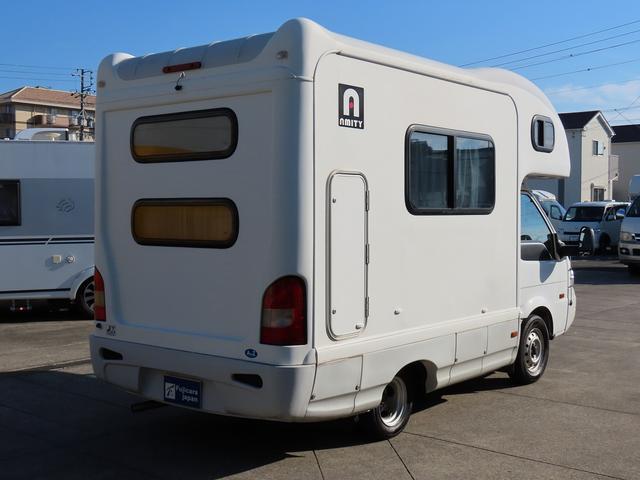 ボンゴトラック ＡｔｏＺ製　アミティ　キャンピングカー　シンク　電子レンジ　１８００Ｗインバータ　シングルサブバッテリー　走行充電　外部充電　給排水ポリタンク　ＤＣ冷蔵庫　マックスファン　アウターシャワー　ＡＣコンセント　エントランス網戸（7枚目）