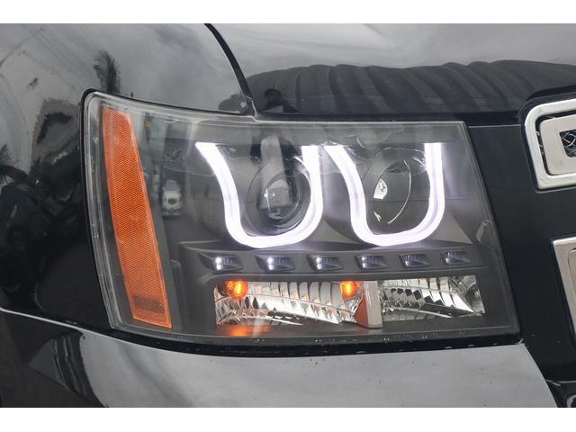 シボレータホ LTZ 4WD サンルーフ シートヒーター 黒革シート RBPアルミ 社外マフラー 社外ヘッドライト 社外メッシュグリル フリップダウンモニタ 1ナンバー登録 3列目あり ETC ALPINE TV(12枚目)