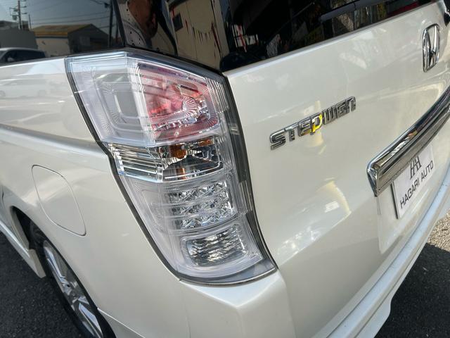 ステップワゴンスパーダ Ｚ　ＨＤＤナビエディション　ワンオーナー　純正ナビ　フルセグテレビ　バックカメラ　両側パワースライドドア　ＥＴＣ　キーレスエントリー　スマートキー　ＨＩＤヘッドライト（24枚目）