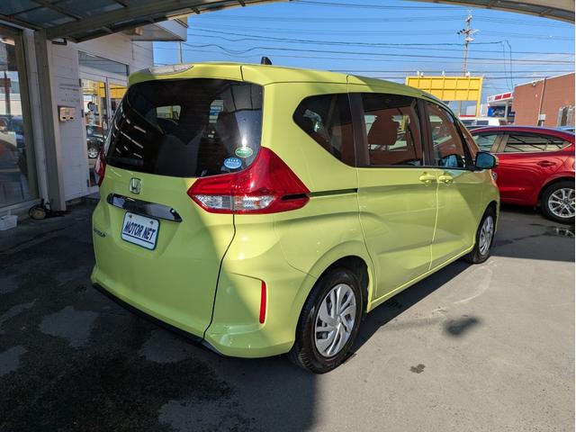 フリード＋ Ｇ・ホンダセンシング　社外ＳＤナビ　ＢＴオーディオ　ドラレコ　ＥＴＣ　バックカメラ　ＣＤ／ＤＶＤ再生　フルセグＴＶ　両側電動スライドドア　追従クルコン　衝突軽減ブレーキ　車線逸脱警報装置　プッシュスタート　ウォークスルー（41枚目）